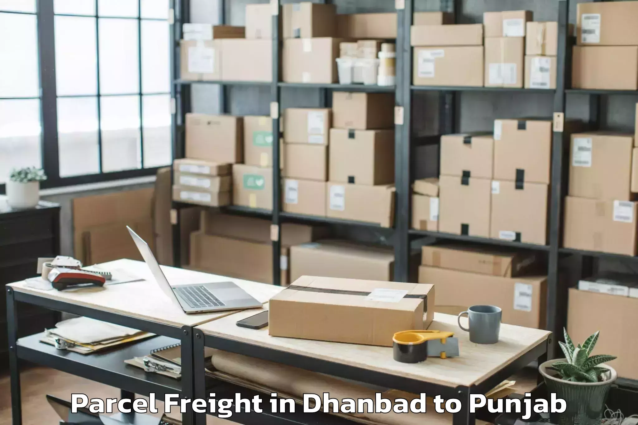 Easy Dhanbad to Raja Sansi Parcel Freight Booking